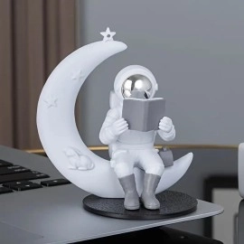Street27 Astronaut Figurine Showpiece for Home Dcor Idols for Office Desk Table Astronaut Toy for Car Dashboard, Statue for Gift Gifting Items Birthday Decoration (Reading on Moon - Silver)